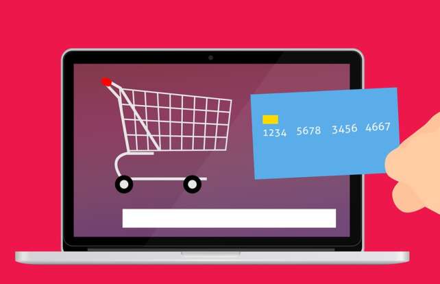 a credit card used for e-commerce on a laptop
