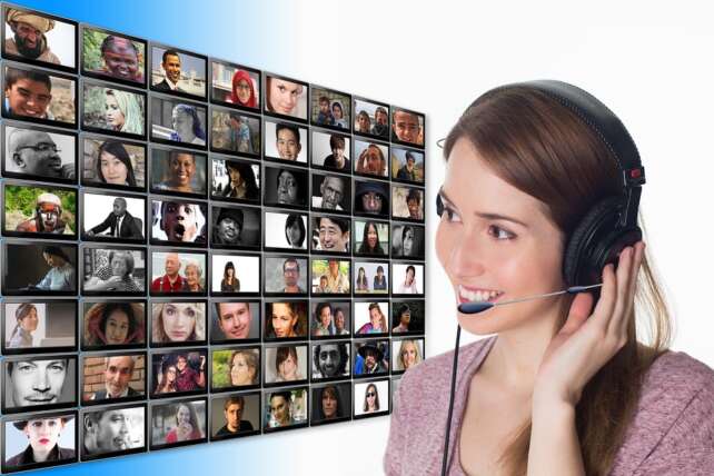 a financial planner with a headset talking to customers